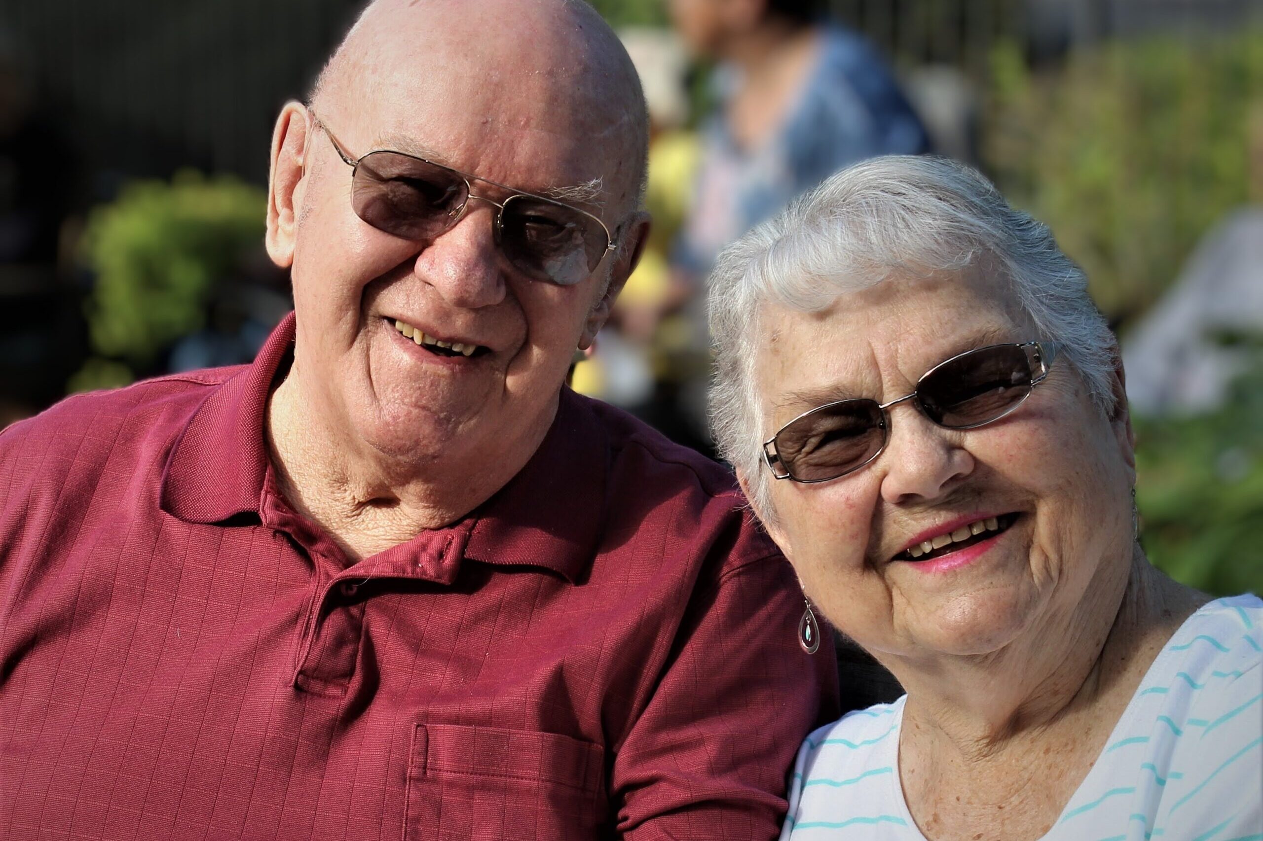 elderly man and woman smiling