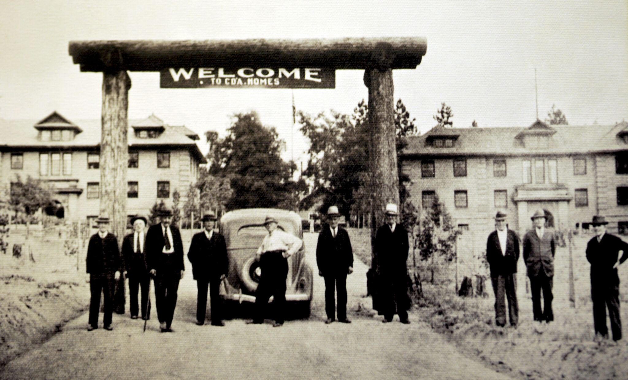 founders standing at original entrance